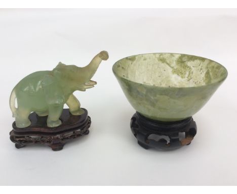A jade finger bowl with stand and jade elephant on stand (2) 