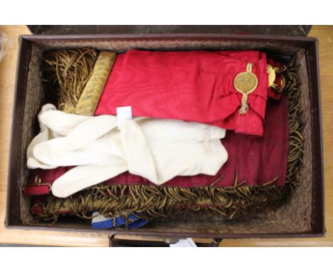 A leather case containing RAOB insignia, to include sash, apron, gloves, etc.