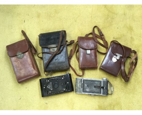 A group of folding lense cameras - Rajar No. 6, Pontiac Paris,m Ensign Selfix 20, Ernemann Dresden, Coronet Rapido, Cocorette