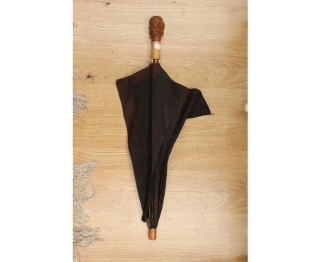 Brigg & Sons, early 20th century ladies parasol with a carved wooden crouching monkey to the handle, with an inscription 'Mrs