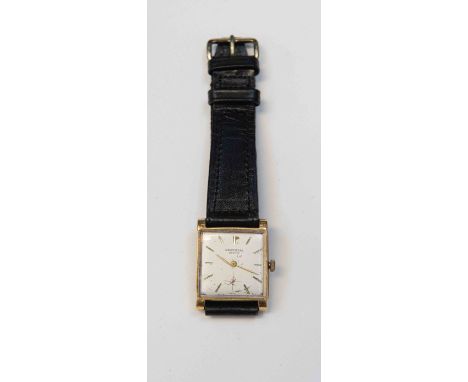 A Universal Geneve 18ct. gold gentleman's wrist watch, manual wind, rectangular silvered baton dial, rectangular snap back ca