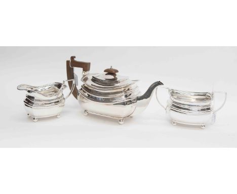 A George V silver, three piece, tea service of boat shape, with beaded border, Birmingham 1927, approx total weight 26ozt