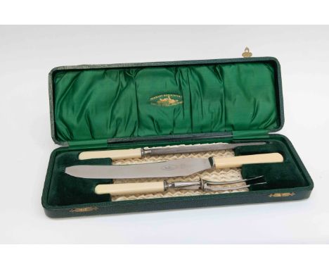 An early 20th century carving set boxed, Canton Workshops, Sheffield, another steel and fork two flan slicers, Art Deco Swiza