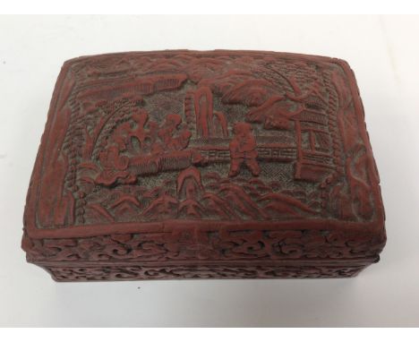 Cinabar trinket box and cover, Chinese character mark to the base. 