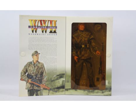 Dragon - A boxed Dragon #70016 1:6 scale WW2 Ukuraine 1944 "Ernst",Wehrmacht Sniper. The figure and accessories appear Mint -