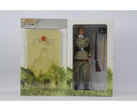 Dragon - A boxed Dragon #70070 1:6 scale WW2 Caucasus 1942 "Gunther" German Gebirgsjager, (Schtuze). The figure appears to ha