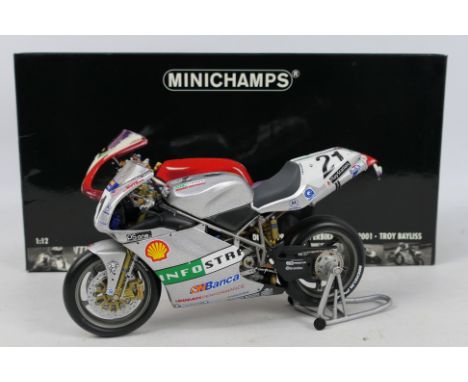 Minichamps - A boxed Troy Bayliss 2001 Ducati 996 R Team bike in 1:12 scale # 011271. The model appears Mint in Good box with