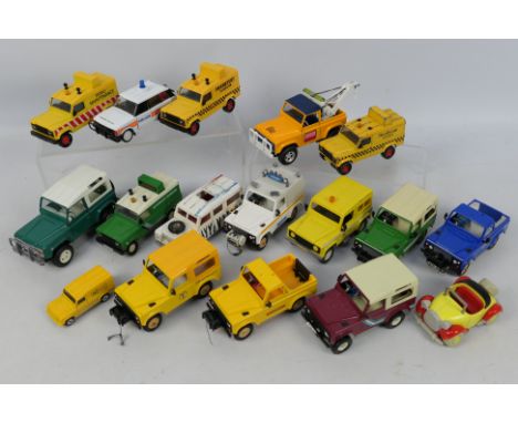 Britains - Corgi - Matchbox - Ertl. A selection of 18 Land Rovers ranging from Playworn to Excellent condition to include: A 