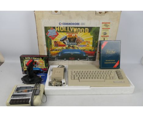Commodore - A boxed Commodore 64C Hollywood edition complete with the keyboard, cassette deck, joystick, user manual and 10 g
