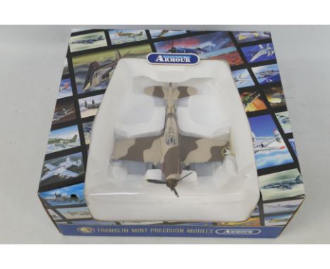 Franklin Mint - Armour Collection - A boxed 1:48 scale #B11B621 #93222 P40 Warhawk USAAF. The model appears to be in excellen