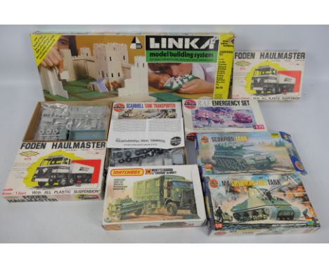 A boxed group of eight model kits in various scales. Lot includes Davrit #702 Foden Haulmaster; Airfix 1:72 #01303 Sherman Ta