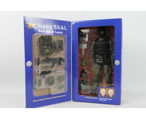 Blue Box  - A boxed Blue Box Toys 'Elite Force' #34221 1:6 scale US Navy Seal Team 8 "Shark" action figure. The figure and ac