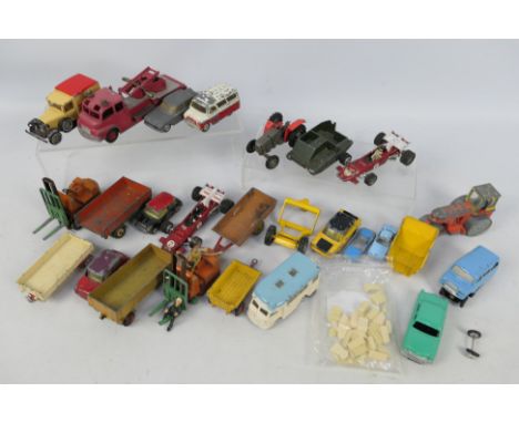 Dinky Toys - Corgi Toys - Matchbox - Marx - Others - An unboxed assembly of playworn diecast vehicles in various scales .Lot 