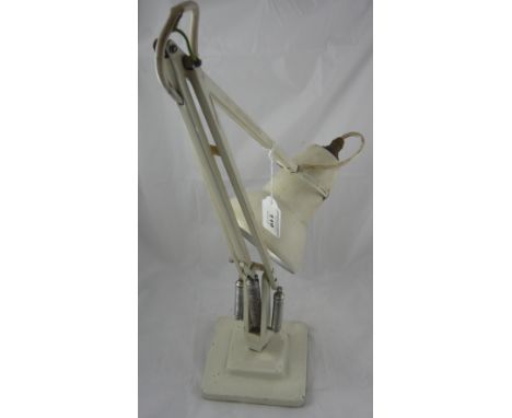 A white painted Herbert Terry & Sons angle poise lamp