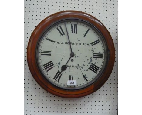 A circular walnut cased wall hanging clock with roman numerals to enamel dial signed H J Norris & Son Coventry, 40cm diameter