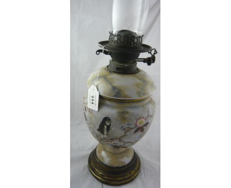 An opaque glass hand painted oil lamp with chimney, 61cm high (hairline)