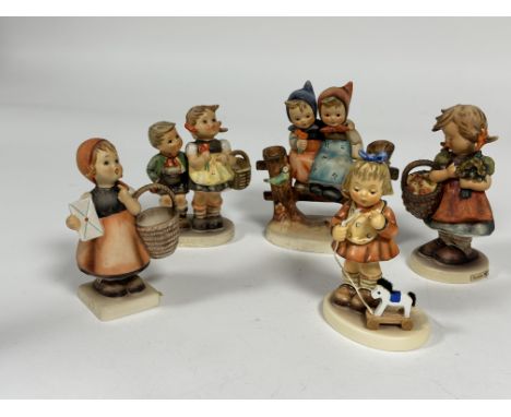 A collection of six German Hummel pottery figures including, My Favourite Pony, Autumn Harvest and Meditation, ( Tallest H x 