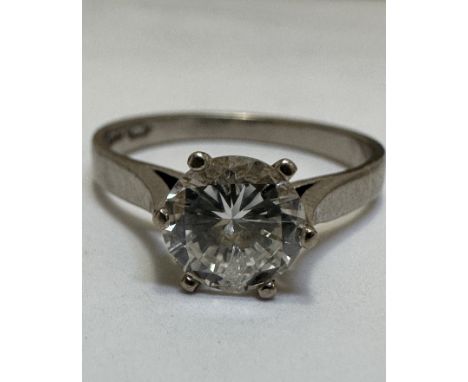 A 18ct white gold Diamond solitaire ring approximately 1ct mounted in claw setting, chip to edge and included, Q. 3.1g