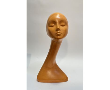 A 1950's/60's moulded fibre figure of a female mannequin head. (h-50cm, w-24cm)