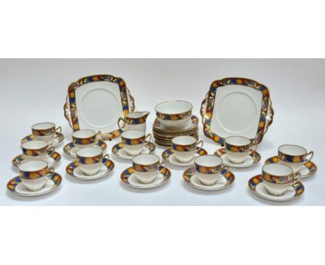 A Standard China art nouveau pattern tea service comprising twelve tea cups, twelve saucers, a milk jug, a bowl (h-7cm), two 