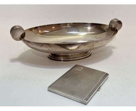 An Art Deco Epns oval dish with circular ring handles to side, (H7.5cm, L26cm), and a Birmingham silver engine turned cigaret