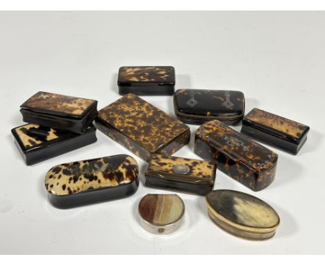 A collection of seven various 19thc tortoise mounted snuff boxes of rectangular form, two faux tortoise boxes, a faux tortois