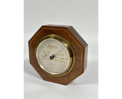 A B. Cooke &amp; Sons, Ltd of Hull Edwardian mahogany box wood and ebony strung octagonal wall barometer with silvered dial, 