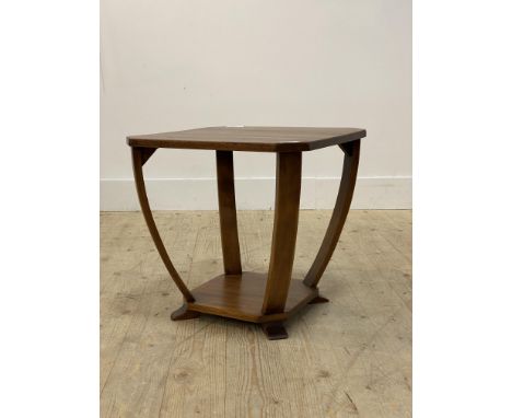 A 1930's Art Deco walnut lamp table, the square top with canted corners raised on four bowed supports united by an under tier