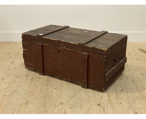 A late 19th / early 20th century metal bound stained pine steamer trunk, bearing old paper labels. H41cm, W92cm, D49cm