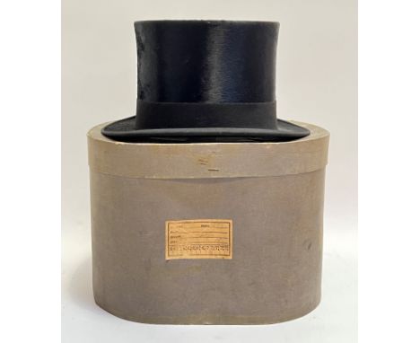 A D. M. Dunlop black top hat and box retailed by Patrick Thompson, Edinburgh (h- 15.5cm)