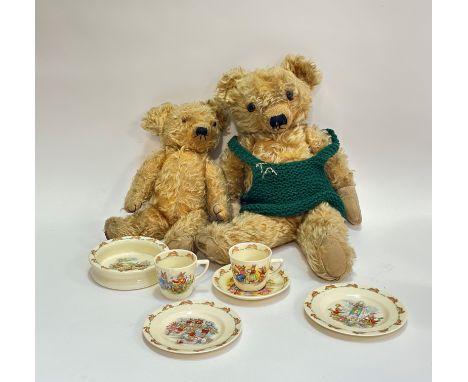 A Royal Doulton children Bunnykins breakfast service comprising a bowl (w-15cm), two plates (w-16cm), two cups (h-7cm) and a 