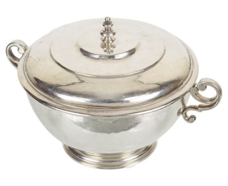 A William III Silver Bowl and Cover:By Pierre Platel, London 1700, of plain circular form, applied with short scroll handles 