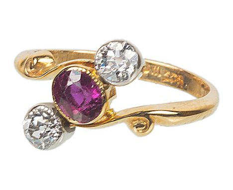 An Edwardian Style 9ct Diamond and Ruby Crossover Ring   CONDITION REPORT:  Weight: 3 gMarked "9 ct & W,G and S"Period cut Di
