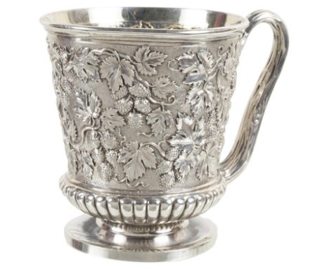 A George IV Silver Mug:By Paul Storr, London 1820, of urn form, the sides embossed and chased with fruiting vine tendrils on 