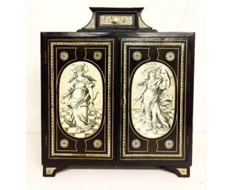 An Italian Baroque Milanese Table Cabinet:17th century, the ivory inlaid doors depicting Greek Goddesses Athena & Diana, open