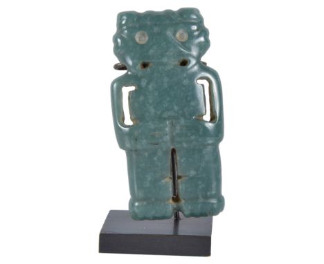 A Costa Rican Jade Ritual Carving, possibly Pre-Columbian:Of a celadon green tone, representing a shaman in the process of tr