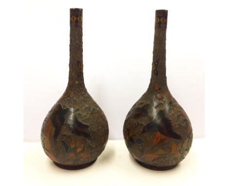 Two Japanese cinnabar lacquer totai shippo vases:Meiji period, the bottle-shaped ceramic body bears throughout a decoration o