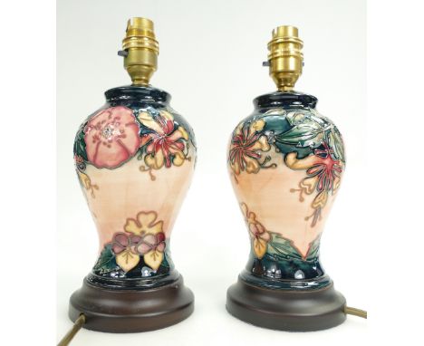 Moorcroft pair of Lamp Bases decorated with Flora &amp; Fauna, height to fitting 25cm, both boxed (2) 