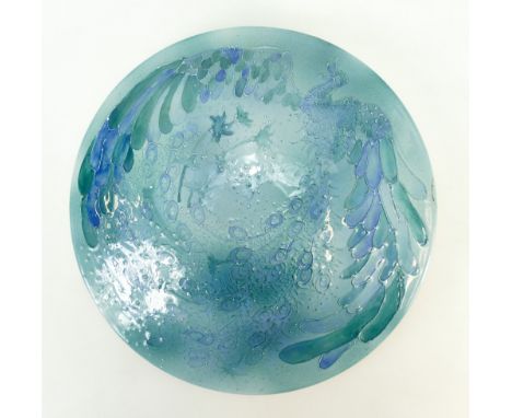 Lise B Moorcroft studio wall plaque decorated with a peacock on light blue ground, dated 1989, height 33cm (small re-stuck ch
