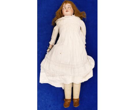 Bisque Head Doll c1900, with half leather body and arms.  Bears the name Special ? or similar to lower back of neck, and the 