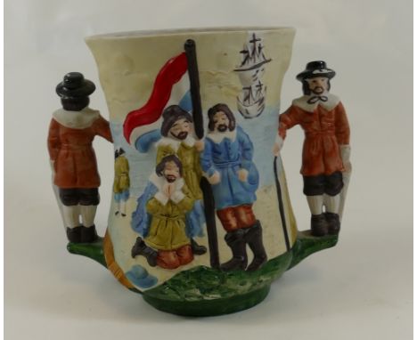 A bisque Loving Cup a small version of the Royal Doulton Jan Van Riebeck Loving Cup, height 13.5cm