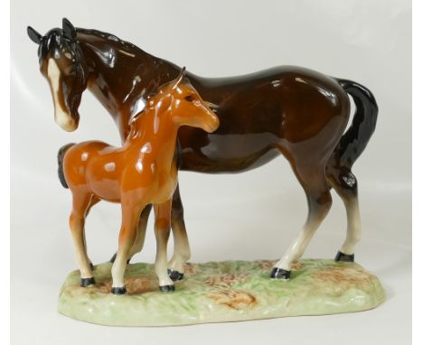 Beswick Horse and Foal on a ceramic plinth. 2nd version, model 953 (2 small chips on two of the ears)