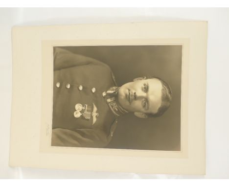 Flight Lieutenant T H L Nicholls RAF - believed to later become Wing Commander in 3 group Bomber command. Large studio portra