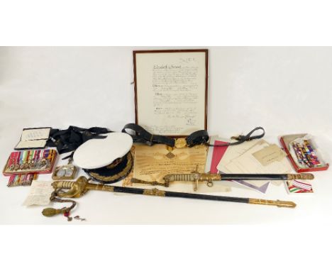 A group of interesting medals, swords and other items relating to Commander Herbert. Aubrey Walkinshaw O.B.E, V.R.D, R.N.V.R,