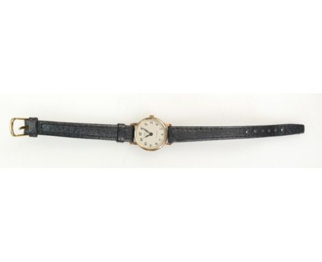 9ct gold Ladies Wristwatch by Garrards, the prestige London Jewellers.  Measures 22mm wide inc. button.