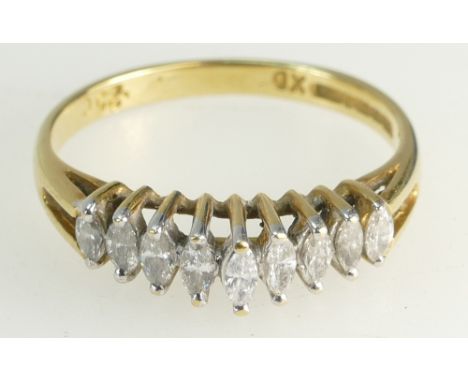 18ct Gold Ladies ring set 9 marquise cut diamonds, approx diamond weight .25ct. Size K total weight 2.4g. High street replace