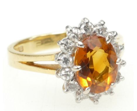 Orange coloured real gemstone ring - possibly orange Sapphire - size M weight 4.6g. 18ct gold.