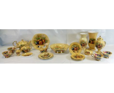 A large collection of Aynsley Orchard Gold china items including tea set, mugs, lidded jars, vases, lamp bases, fruit bowls, 