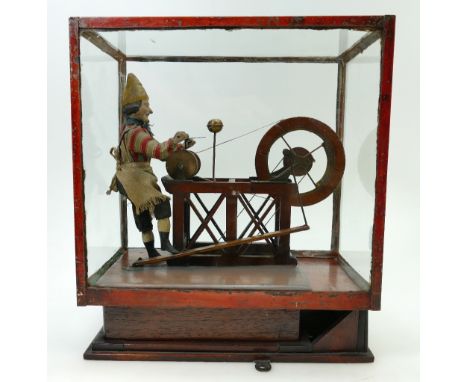 19th century Lever-Operated Automaton wood automaton figure of the scissor sharpener, in wood display case, height 34x w30cm