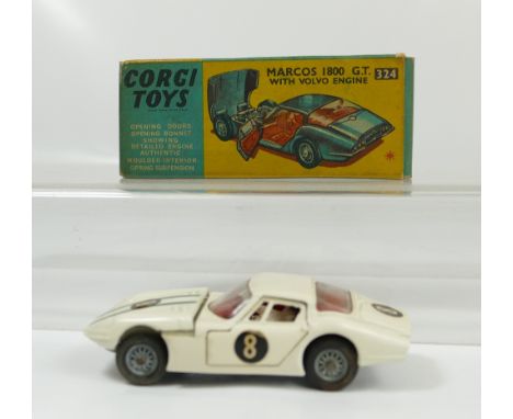 Corgi 324 White Marcos 1800GT with Volvo engine. Near mint condition though bonnet sits fractionally open, and in original go